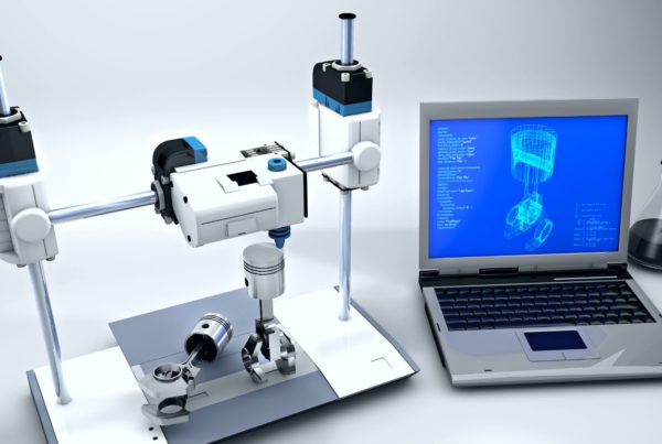 3d rendering of a robotic arm connected to a laptop displaying blueprints, with a flask on a white surface.